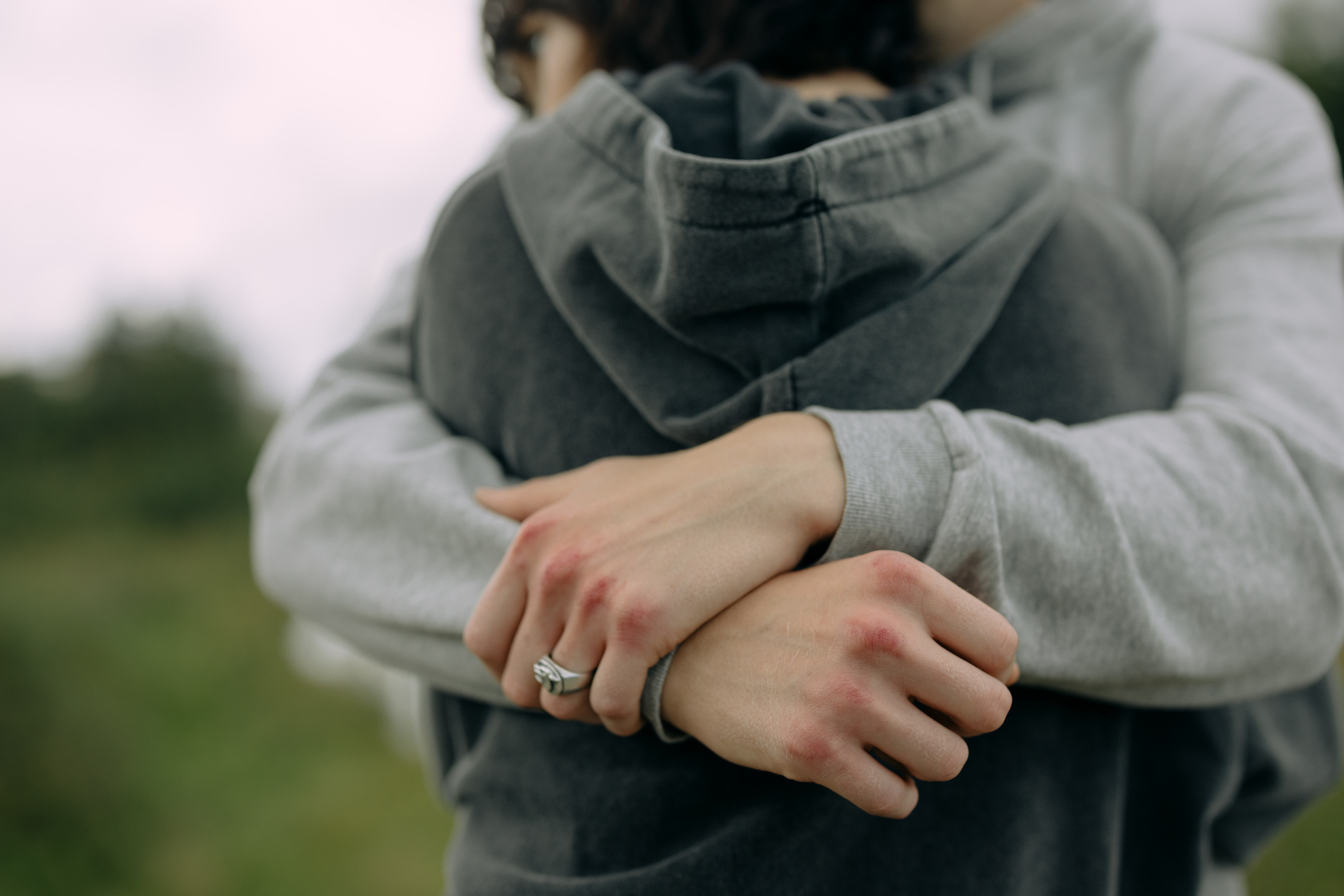 A Close-Up Shot of a Couple Hugging Each Other